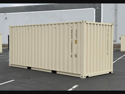 Brand new 20ft beige shipping container side angle view with cargo doors closed - Australia Wide Container Pty Ltd