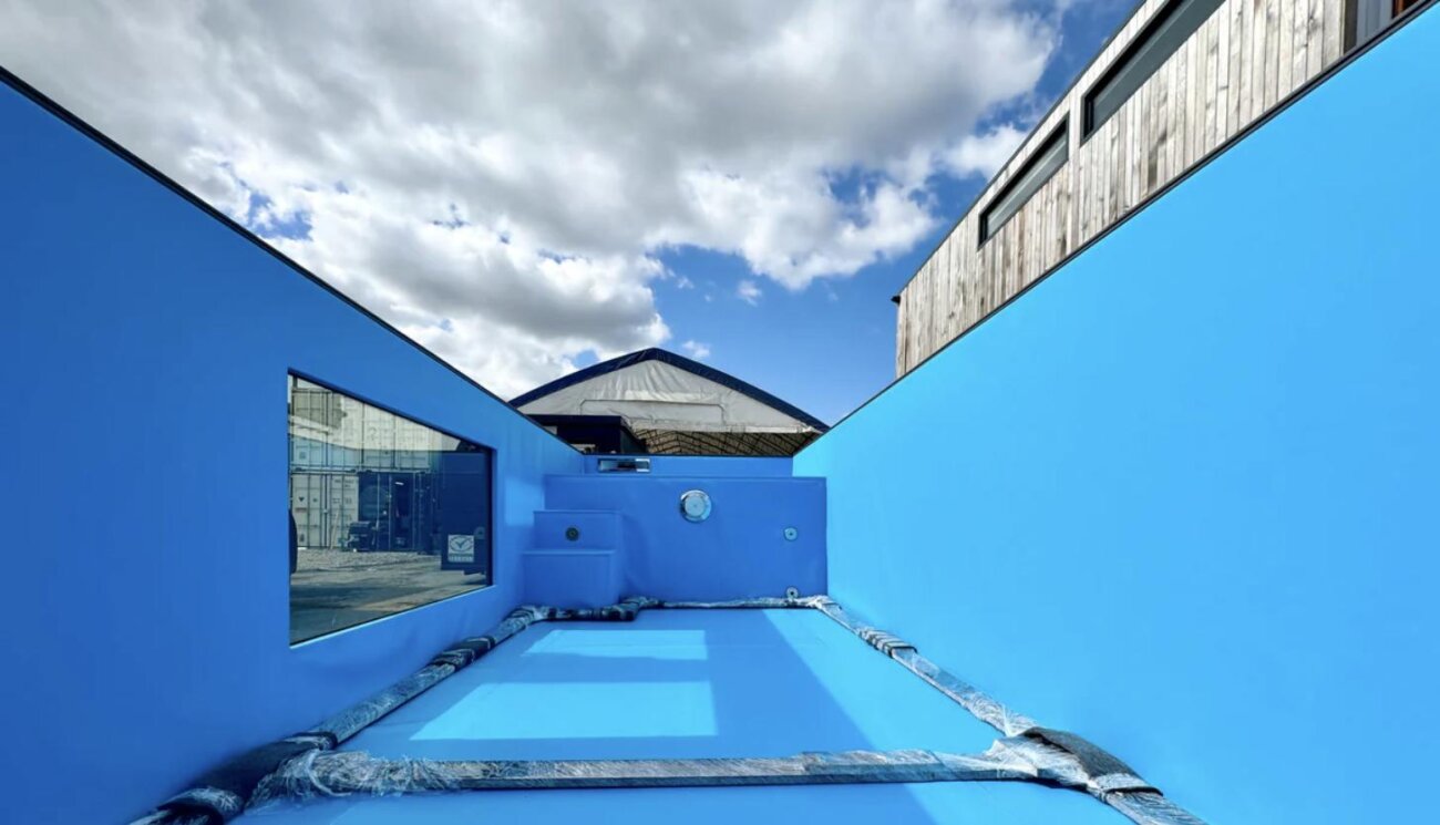 Interior basin of a 40ft container pool with blue liner